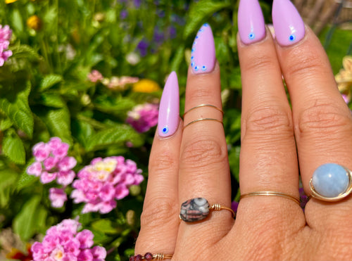 fossilized pink coral ring