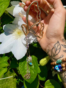 butterfly lotus drippy crystal clip